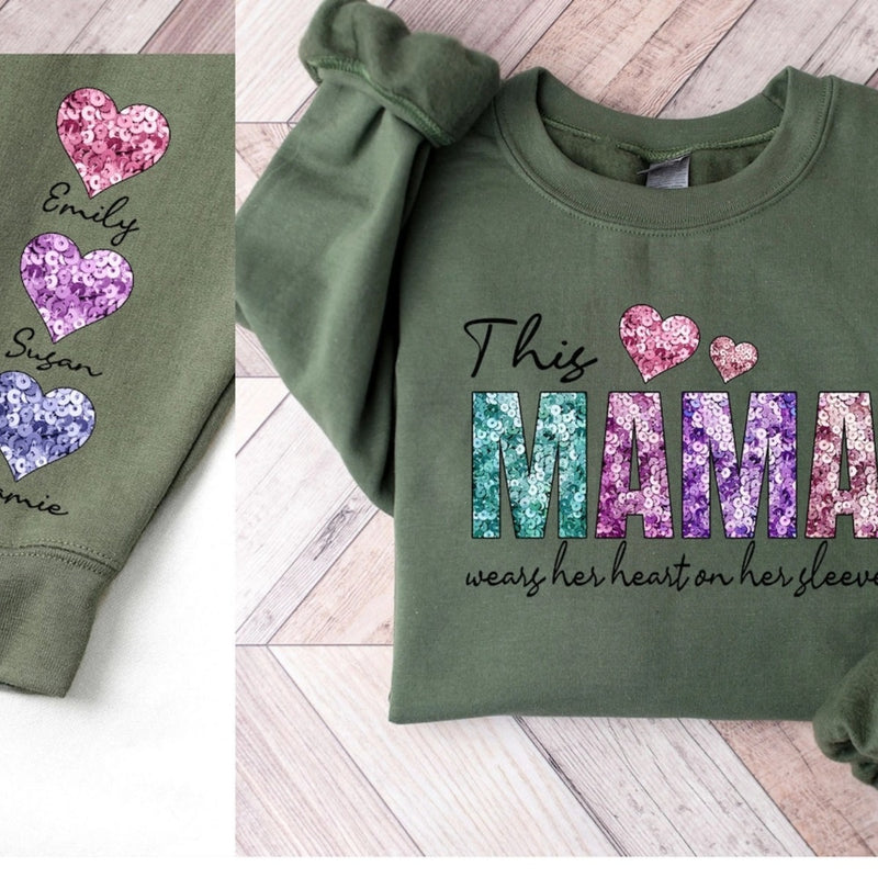 This Mama Wears Her Heart On Sleeve - Personalized Kids Name On The Sleeve Sweatshirt - Faux Glitter Tee - Mothers Day Gift - Valentine's Day Sweatshirt -Perfect Christmas Gift for Mom